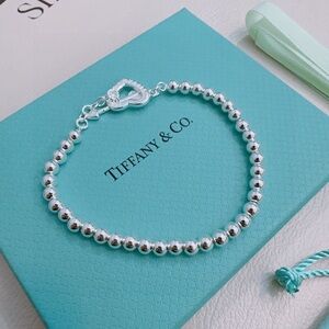 Tiffany & Co. Sterling Silver Bead Bracelet with Lobster Clasp on Signature Blue
